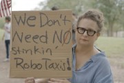 占卜免费特斯拉在得州奥斯汀遭遇抗议活动：反对马斯克Robotaxi计划